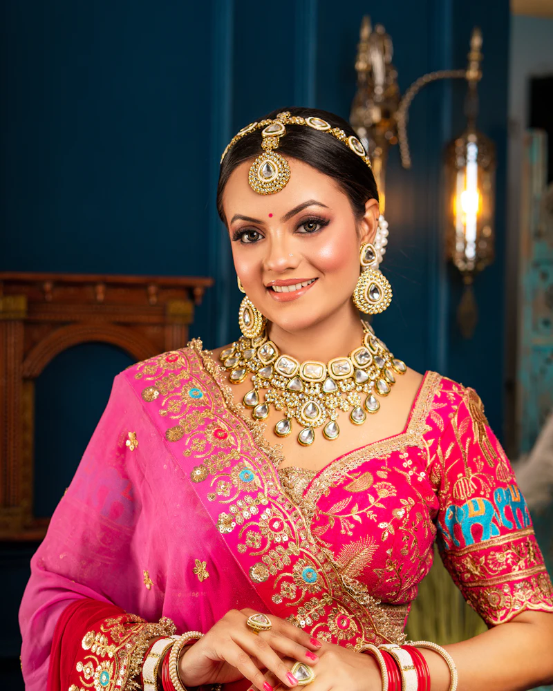 Close-up of soft engagement makeup with a rosy lip and gold earrings, Finenticee studio Bhubaneswar
