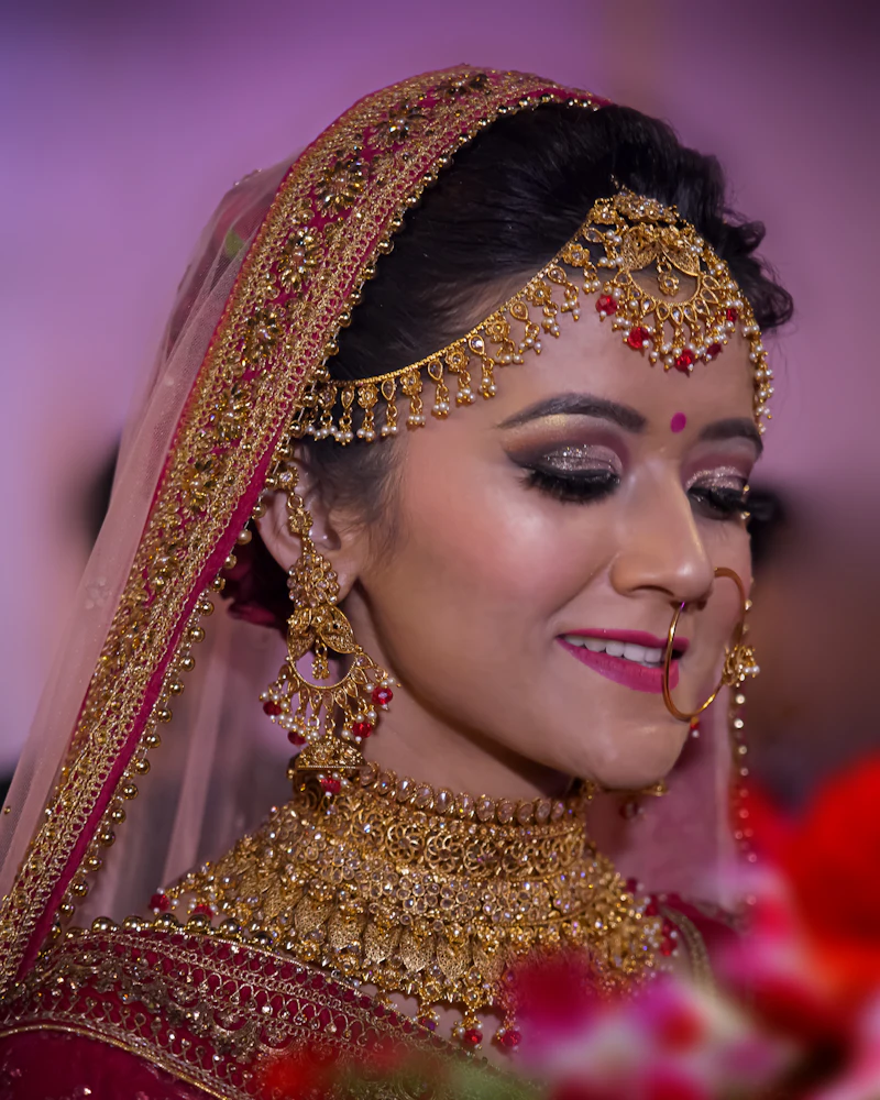 Odia bride in red and gold silk saree with gold jewellery, Finenticee Makeover & Academy, Bhubaneswar