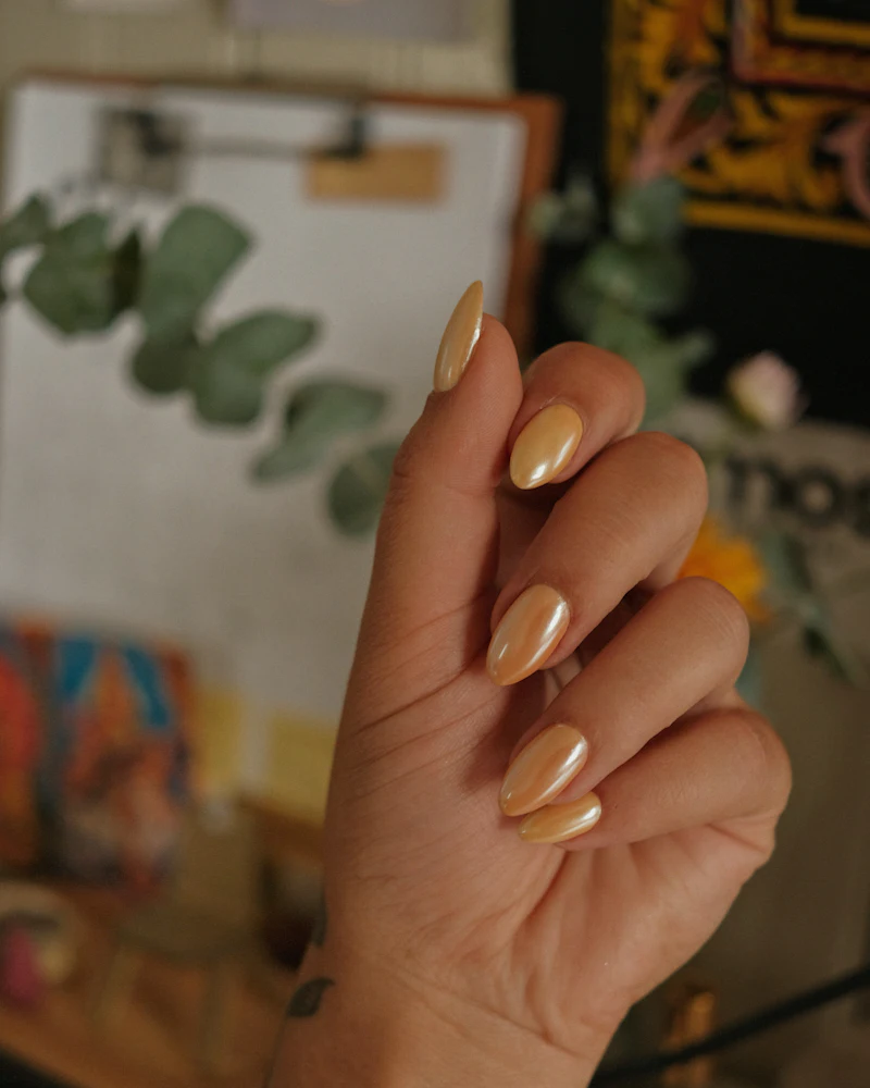 Portrait of a Finenticee student with her nail art work